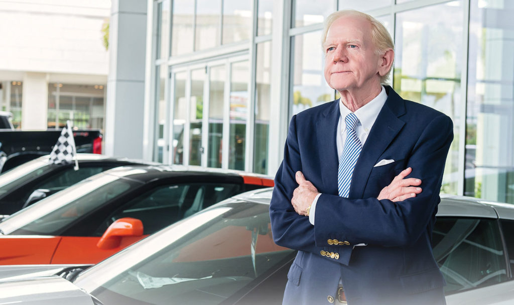 Bill Wallace stands out front of his Wallace Chevrolet Dealership near Stuart, Florida